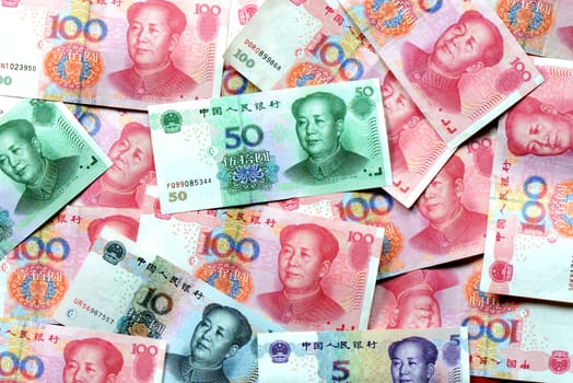 Pile of RMB bank notes as money background