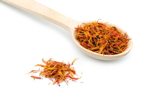 saffron spice in wooden spoon isolation white background