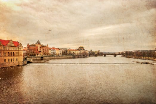 Prague. Vltava. Czech Republic. View from Charles Bridge, textured old paper