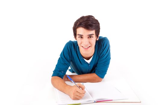 Young happy student carrying books on white backgound