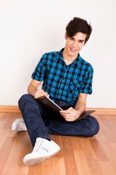 Young man studying at home