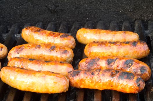 Italian sausages on grill outdoor barbeque