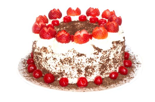 Full Black forest cake well decorated with cherries and strawberries