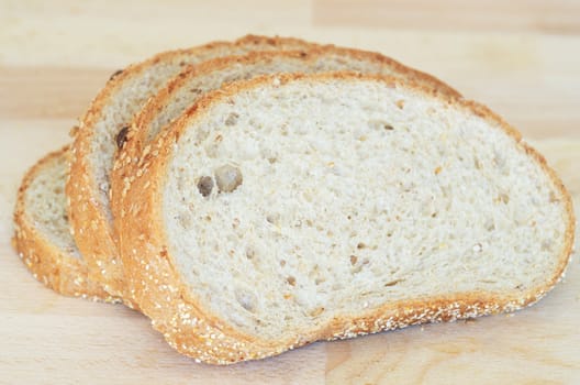 Whole grain sandwich sliced on cutting board