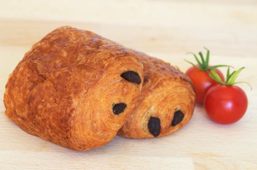 French chocolatine on  wooden cutting board