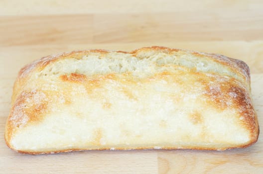 Italian ciabatta bread on cutting board