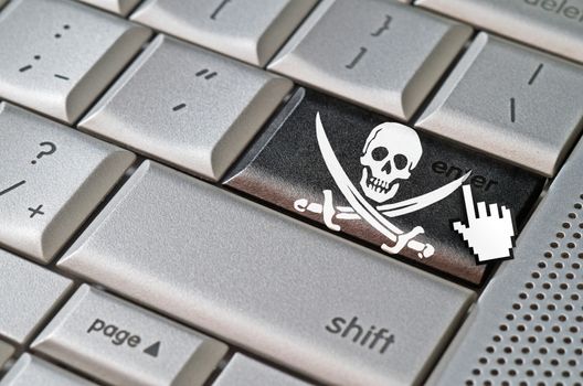 Business concept mouse cursor pressing pirate enter key on metallic keyboard