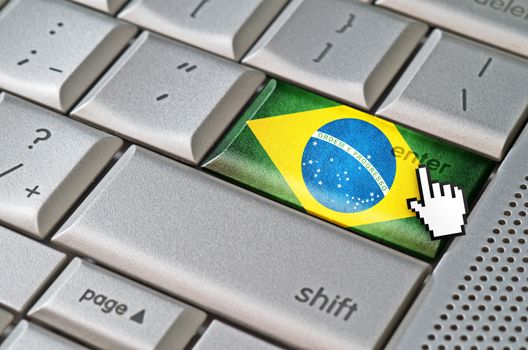 Business concept mouse cursor pressing Brazil enter key on metallic keyboard