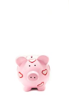 Pink piggy bank on white background 