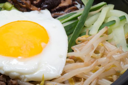 Korean traditional bibimbap in a clay pot