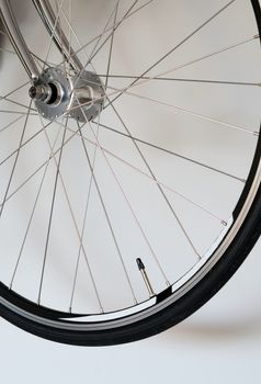 detail of bicycle wheel on white background