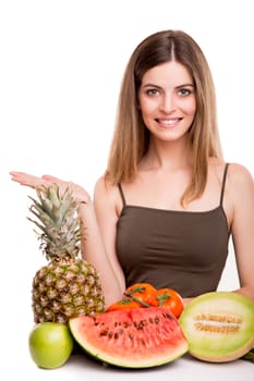 Woman with vegetables and fruits over white background