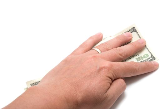 Hand hiding the stash of American banknotes on white background