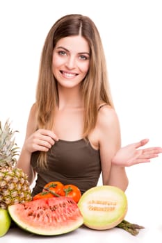 Woman with vegetables and fruits over white background