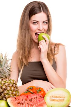 Woman with vegetables and fruits over white background
