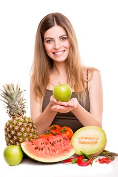 Woman with vegetables and fruits over white background