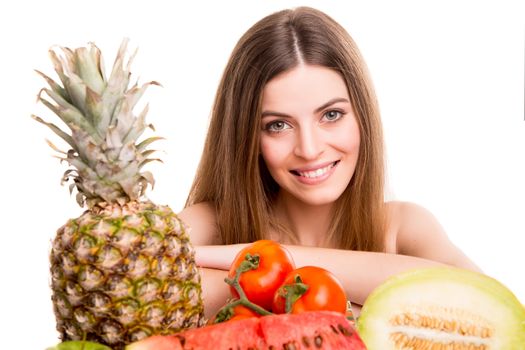 Woman with vegetables and fruits over white background