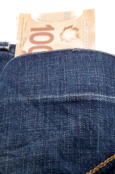 Hundred Canadian dollars bills in the back jean pocket 