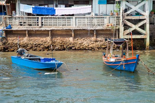 Small fishing boat. Parked in the coast. Small boats for fishing by fishermen.