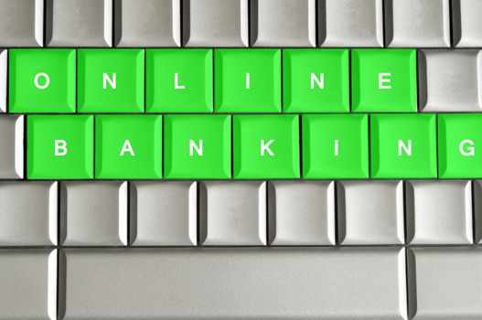 Online Banking spelled on a silver metallic keyboard