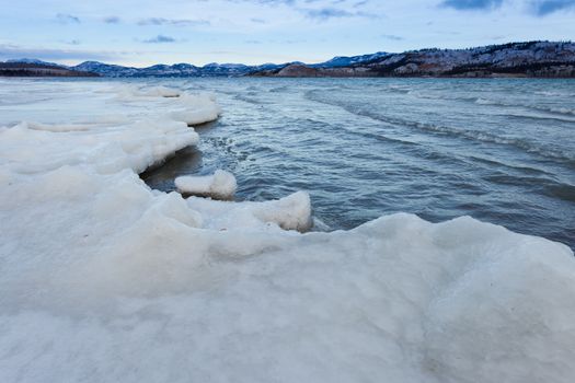 Shore ice during freeze-up of Lage Laberge, Yukon Territory, Canada, winter landscape