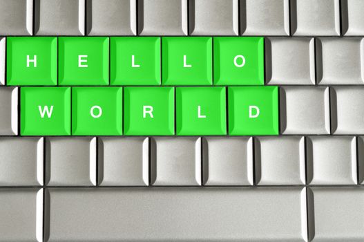 Hello world spelled on metallic keyword, concept of software programmers