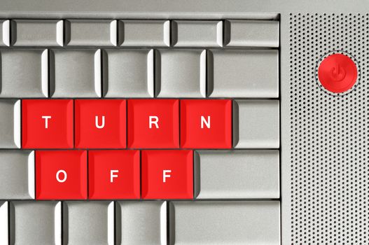 Turn off in red on a metallic keyboard