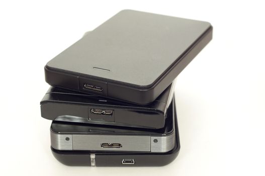 Pile of four external USB hard drives