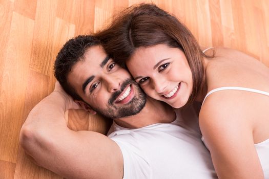 Love Couple at home relaxing on the floor
