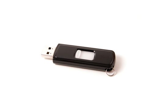 Black retractable  USB key on white background