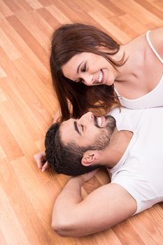 Love Couple at home relaxing on the floor