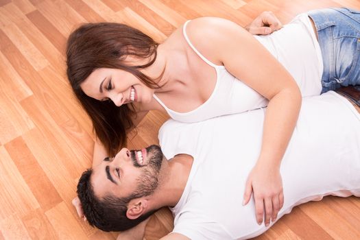 Love Couple at home relaxing on the floor