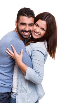 Young love couple hugging over white background