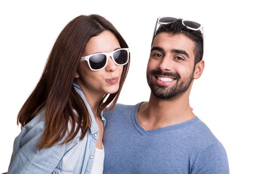 Portrait of a funny couple wearing sunglasses 