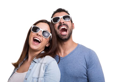 Portrait of a funny couple wearing sunglasses 