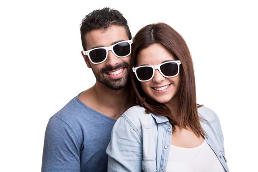 Portrait of a funny couple wearing sunglasses 