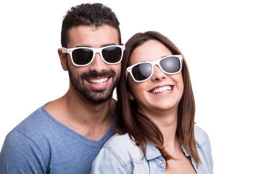 Portrait of a funny couple wearing sunglasses 