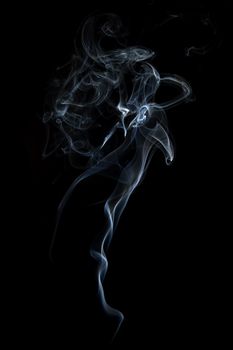 Abstract smoke isolated on black background.