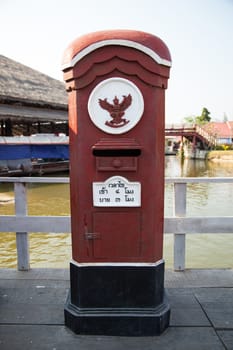 Old country mailbox with red as the main color unique to the post office.