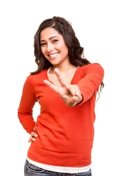 Beautiful young woman showing peace / victory sign