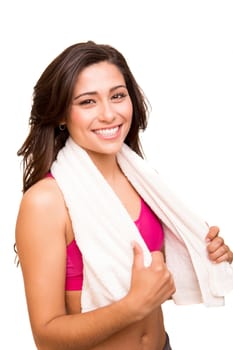 Attractive fitness woman posing with gym towel 