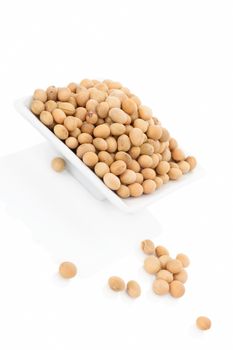 Soybeans isolated on white background. Vegetarian and vegan eating concept.
