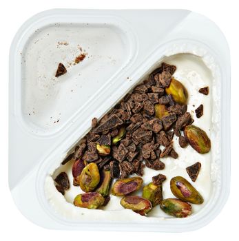 Peach Flavored Greek Yogurt with Pstachio and Chocolate Sprinkles Over White.