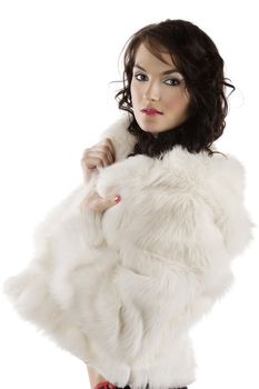 close up portrait of a brunette with make up and hair style waring a white fur