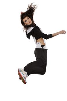modern young woman dancer in hip hop style jumping over white background and looking in camera