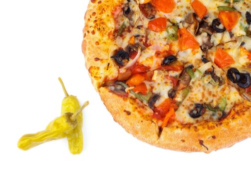 Hot Vegetarian Pizza with Tomatoes, Black Olives and Two Jalapeno Peppers isolated on white background. Top View