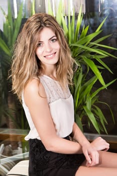 Portrait of a blond woman in a beauty center