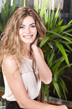 Portrait of a blond woman in a beauty center