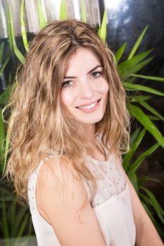 Portrait of a blond woman in a beauty center