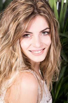 Portrait of a blond woman in a beauty center